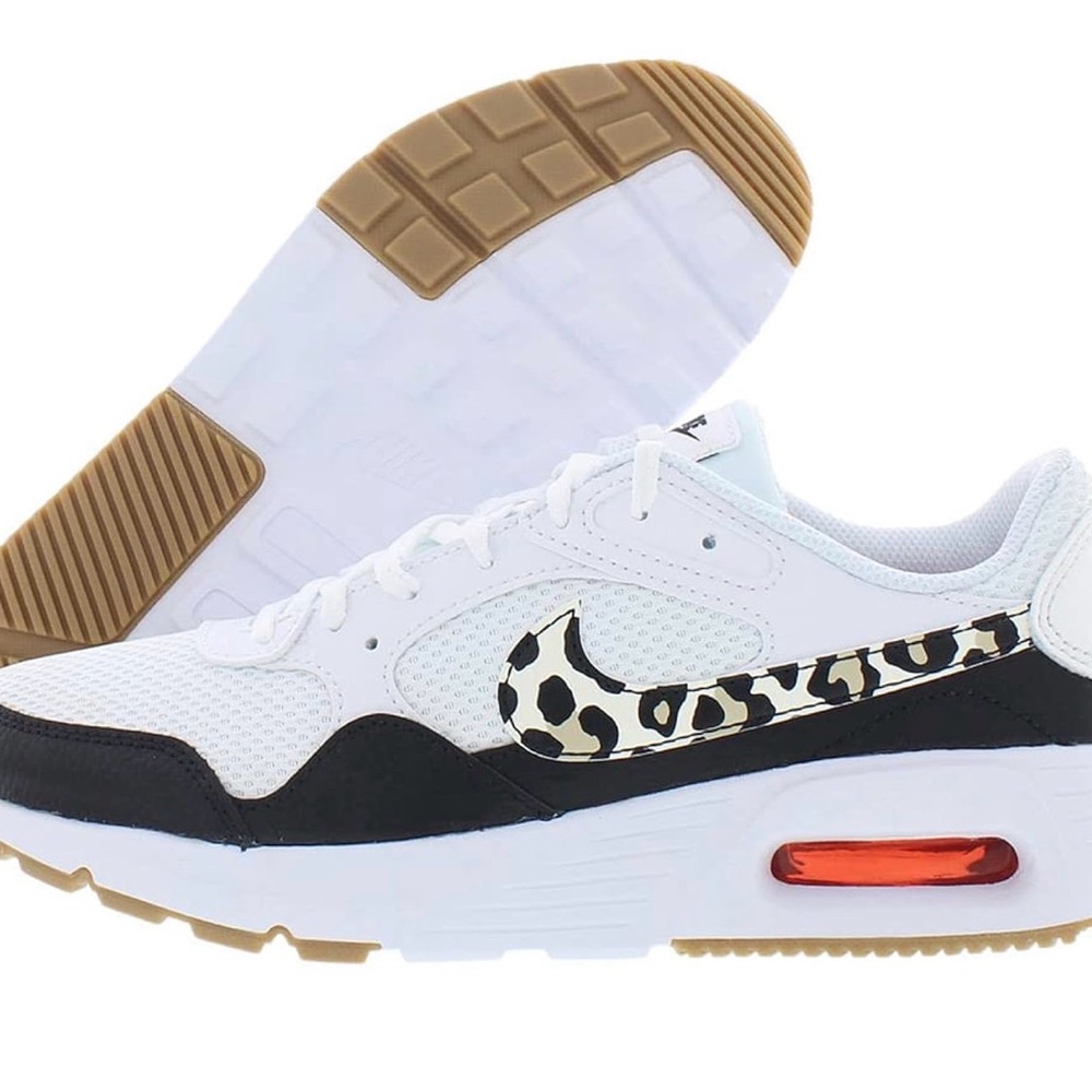 Nike White and Black women’s Sneakers with Patterned Swoosh